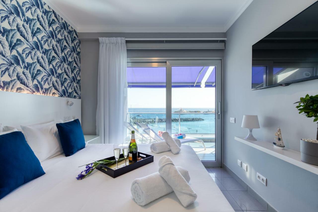 Teresita Mogamar Beachfront ปวยร์โต เด มอแกน ภายนอก รูปภาพ