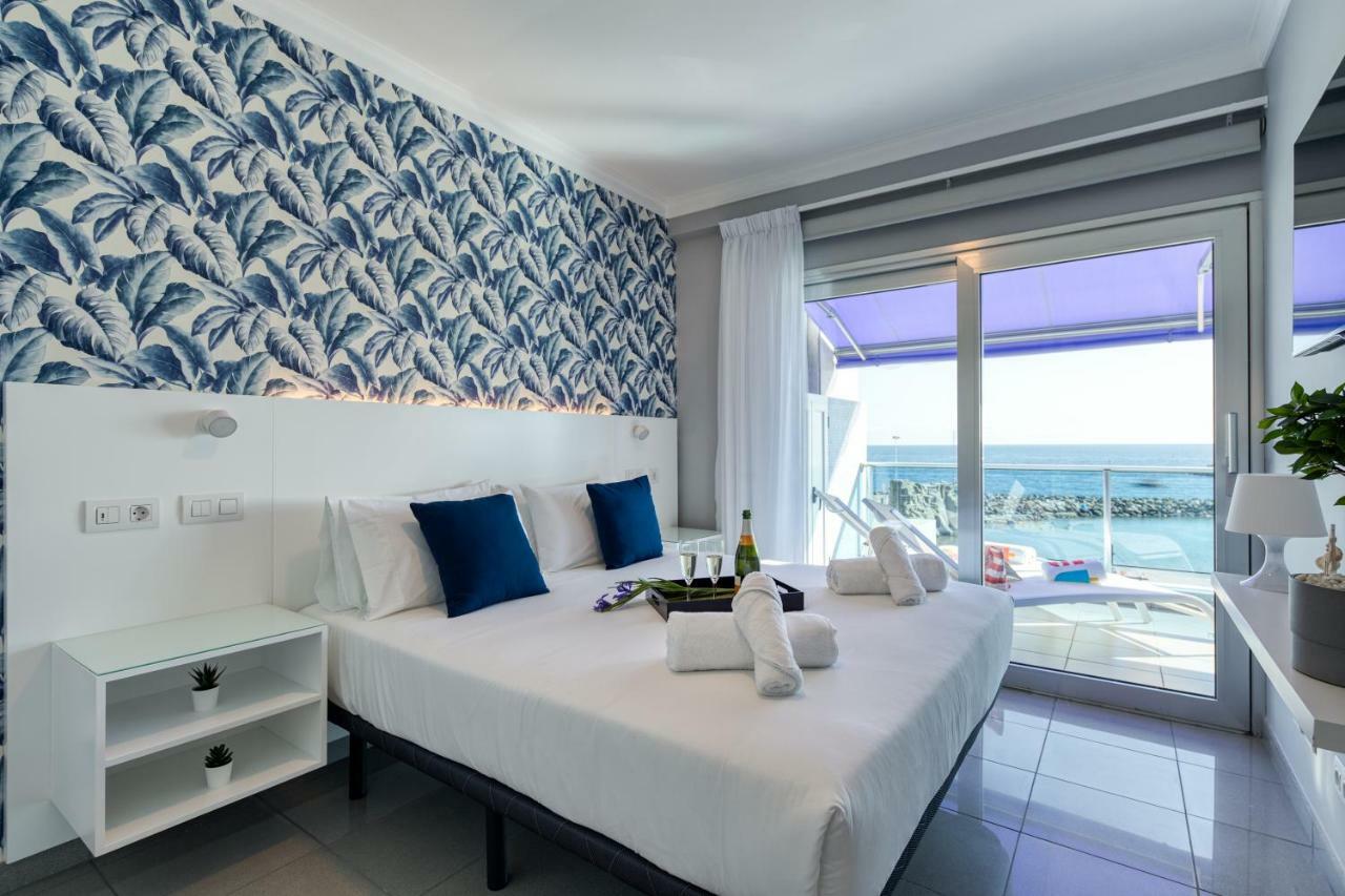 Teresita Mogamar Beachfront ปวยร์โต เด มอแกน ภายนอก รูปภาพ